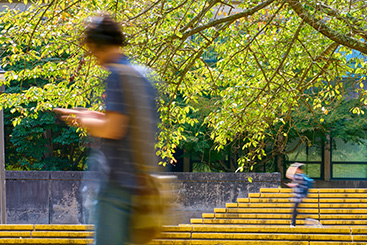 Students walking on campus. Links to Gifts of Real Estate