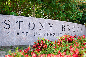 Stony Brook University stone sign. Links to Gifts from Retirement Plans